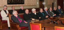 A section of the clergy including the Bishop of Connor (back, centre) in the Senate Chamber at Stormont.